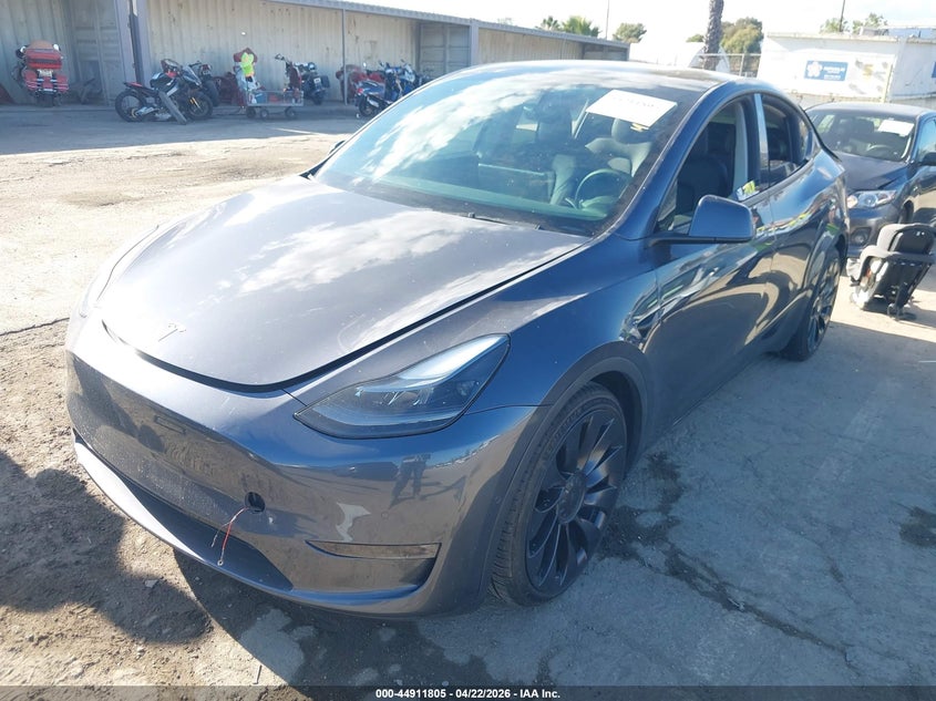 2022 Tesla Model y VIN 7SAYGDEF7NF491794 IAAI salvage auction — REAR END, Salvage Title, sold $9,500 on 2026-08-02 (photo 2)