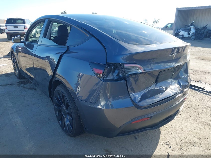 2022 Tesla Model y VIN 7SAYGDEF7NF491794 IAAI salvage auction — REAR END, Salvage Title, sold $9,500 on 2026-08-02 (photo 3)