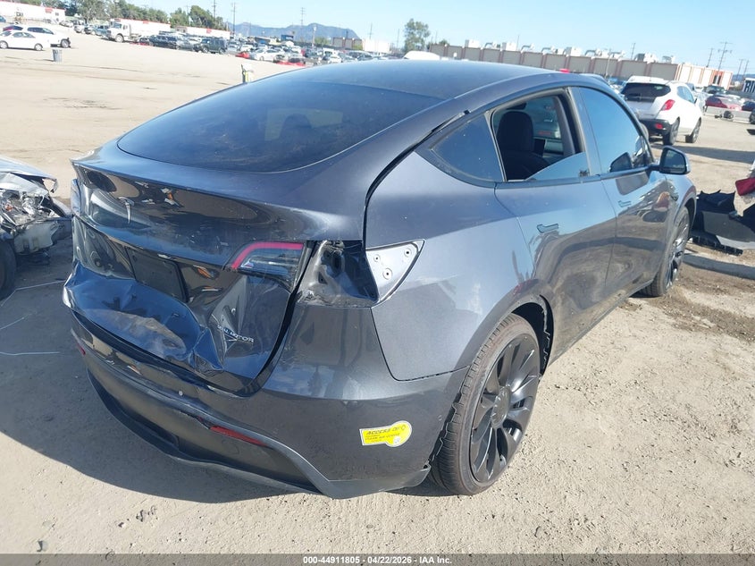 2022 Tesla Model y VIN 7SAYGDEF7NF491794 IAAI salvage auction — REAR END, Salvage Title, sold $9,500 on 2026-08-02 (photo 4)