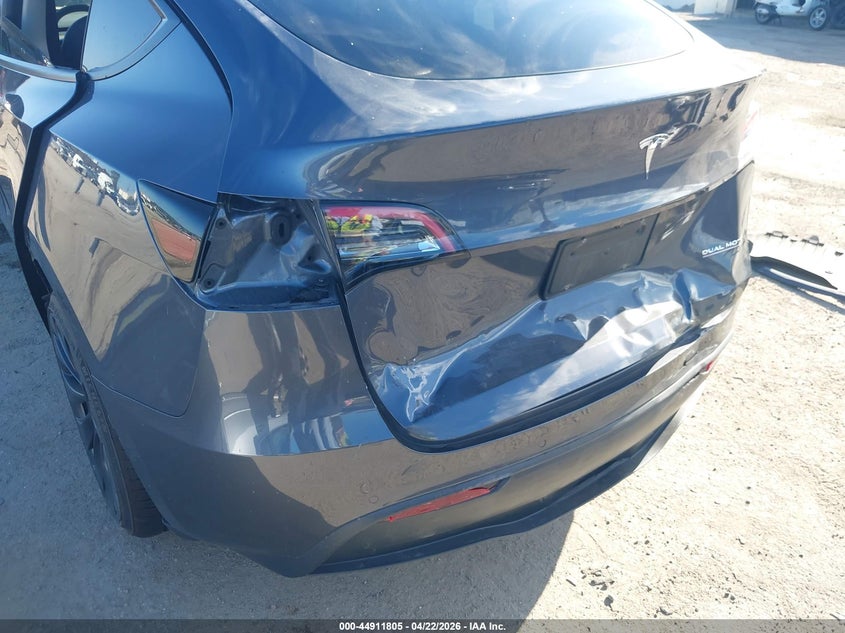 2022 Tesla Model y VIN 7SAYGDEF7NF491794 IAAI salvage auction — REAR END, Salvage Title, sold $9,500 on 2026-08-02 (photo 6)