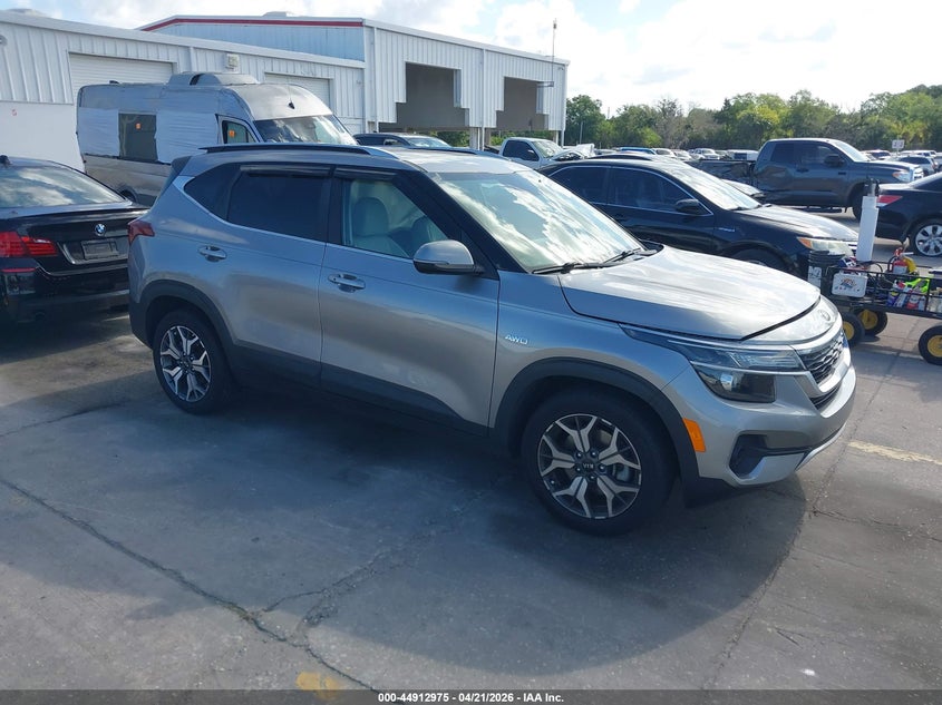 2021 Kia Seltos VIN KNDERCAA2M7160141 IAAI salvage auction — LEFT FRONT, Rebuildable (Florida), sold $4,550 on 2026-07-08 (photo 1)
