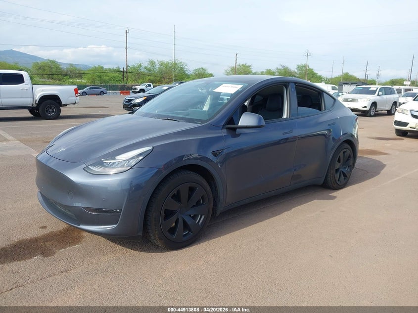 2022 Tesla Model y VIN 7SAYGAEEXNF366830 IAAI salvage auction — RIGHT SIDE, Salvage (Hawaii), sold $8,450 on 2026-07-30 (photo 2)