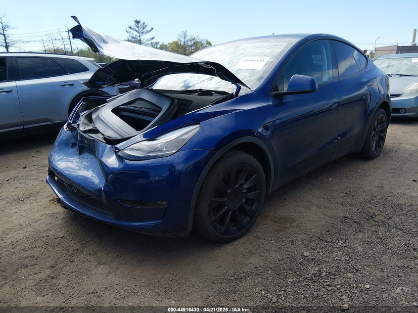 2024 Tesla Model y VIN 7SAYGDEE8RA234136 IAAI salvage auction — FRONT & REAR, Salvage (New Jersey), sold $11,300 on 2026-08-02 (photo 2)