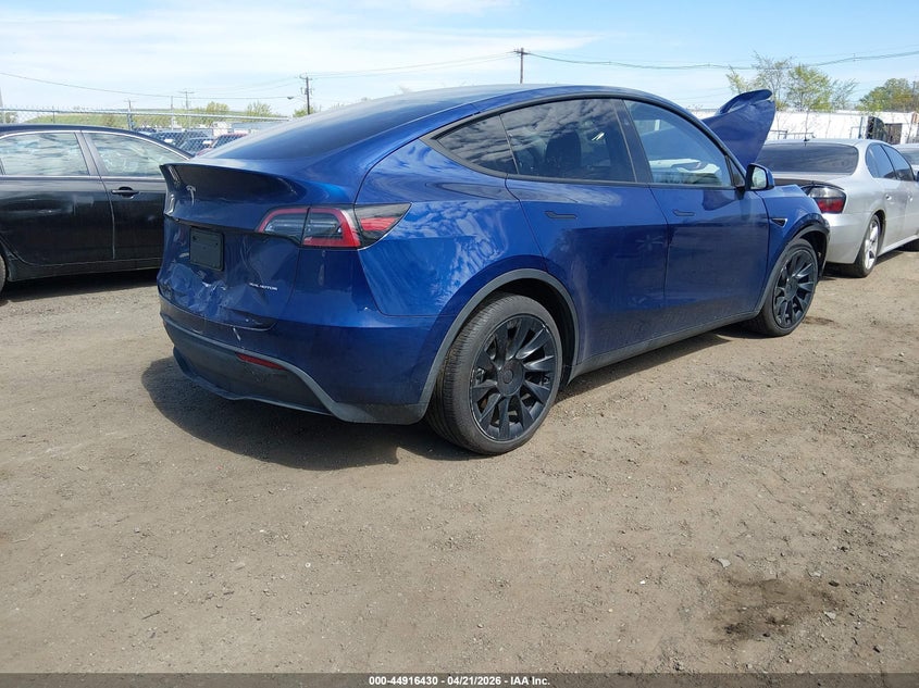 2024 Tesla Model y VIN 7SAYGDEE8RA234136 IAAI salvage auction — FRONT & REAR, Salvage (New Jersey), sold $11,300 on 2026-08-02 (photo 4)