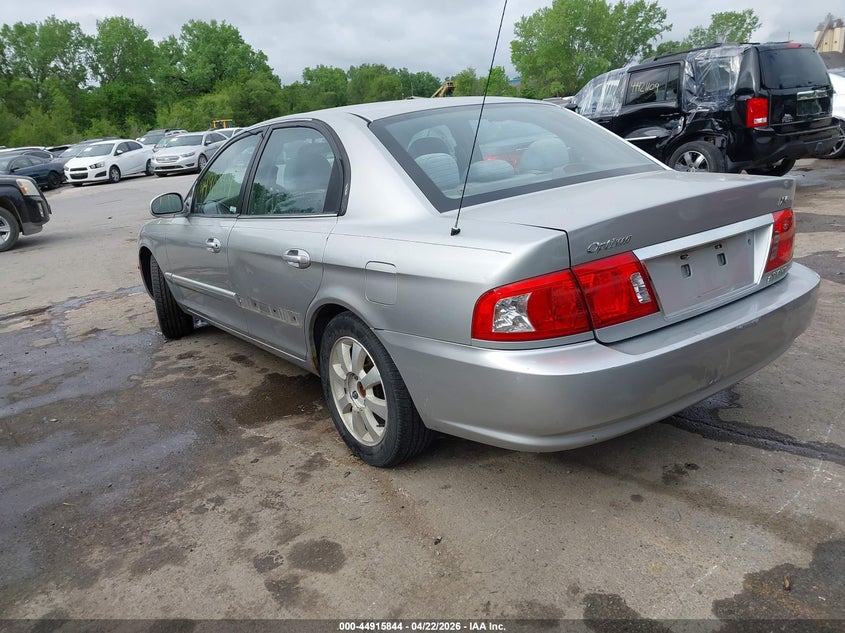 2006 Kia Optima VIN KNAGD128365441383 IAAI salvage auction — LEFT SIDE, Salvage (Missouri), sold $400 on 2026-07-15 (photo 3)