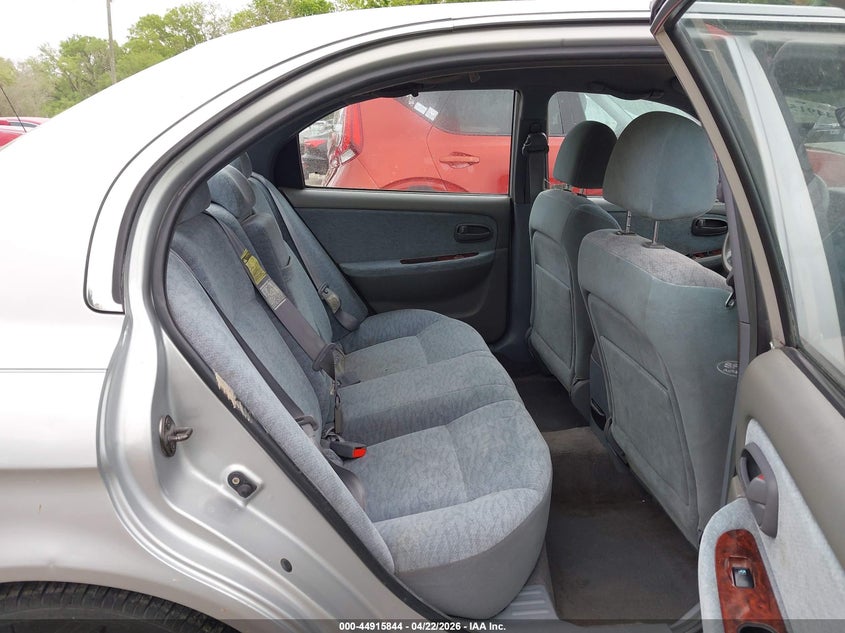 2006 Kia Optima VIN KNAGD128365441383 IAAI salvage auction — LEFT SIDE, Salvage (Missouri), sold $400 on 2026-07-15 (photo 8)