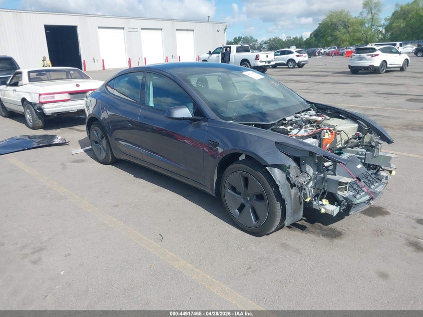 2023 Tesla Model 3 VIN 5YJ3E1EA3PF657716 IAAI salvage auction — FRONT END, Salvage Title, sold $5,400 on 2026-07-12 (photo 1)