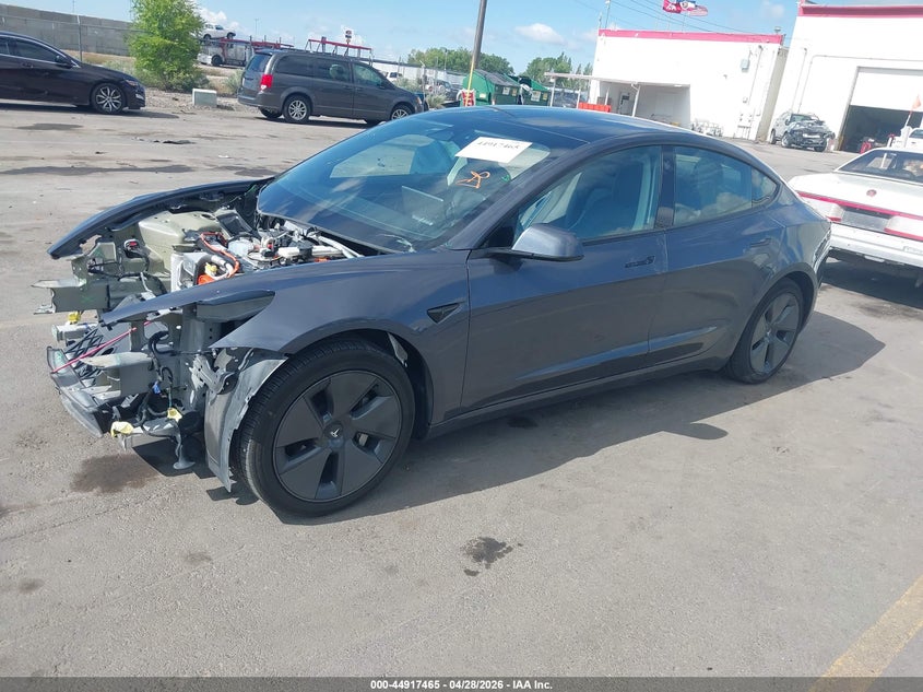 2023 Tesla Model 3 VIN 5YJ3E1EA3PF657716 IAAI salvage auction — FRONT END, Salvage Title, sold $5,400 on 2026-07-12 (photo 2)