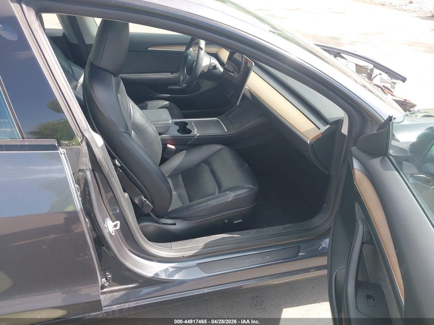 2023 Tesla Model 3 VIN 5YJ3E1EA3PF657716 IAAI salvage auction — FRONT END, Salvage Title, sold $5,400 on 2026-07-12 (photo 5)