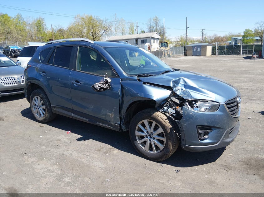 2016 Mazda Cx-5 VIN JM3KE2CY1G0689216 IAAI salvage auction — RIGHT FRONT, Salvage Title, sold $1,900 on 2026-07-28 (photo 1)
