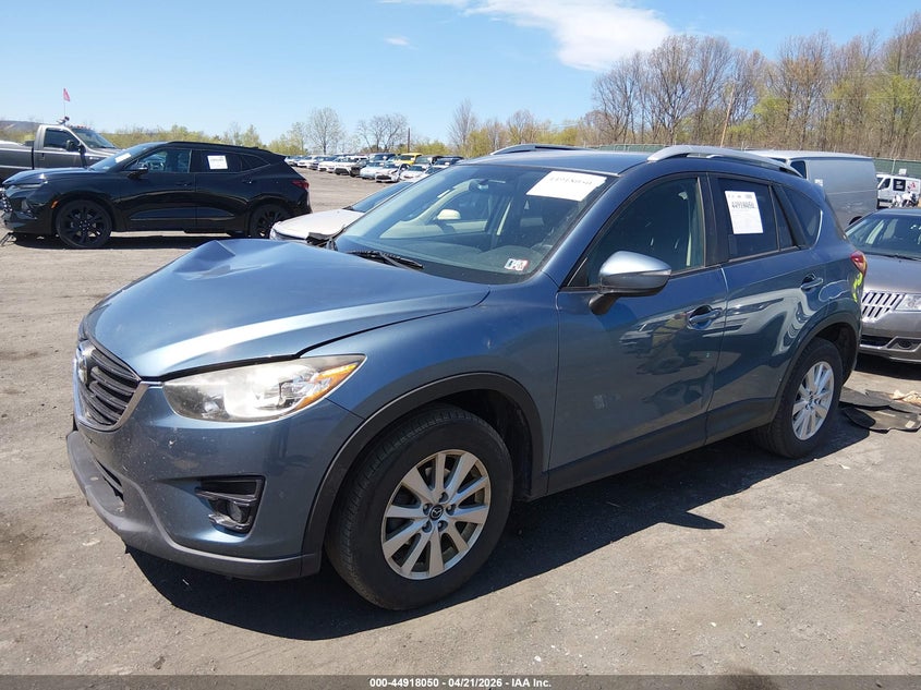 2016 Mazda Cx-5 VIN JM3KE2CY1G0689216 IAAI salvage auction — RIGHT FRONT, Salvage Title, sold $1,900 on 2026-07-28 (photo 2)