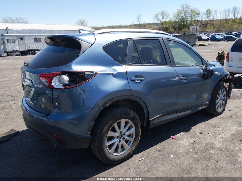 2016 Mazda Cx-5 VIN JM3KE2CY1G0689216 IAAI salvage auction — RIGHT FRONT, Salvage Title, sold $1,900 on 2026-07-28 (photo 4)