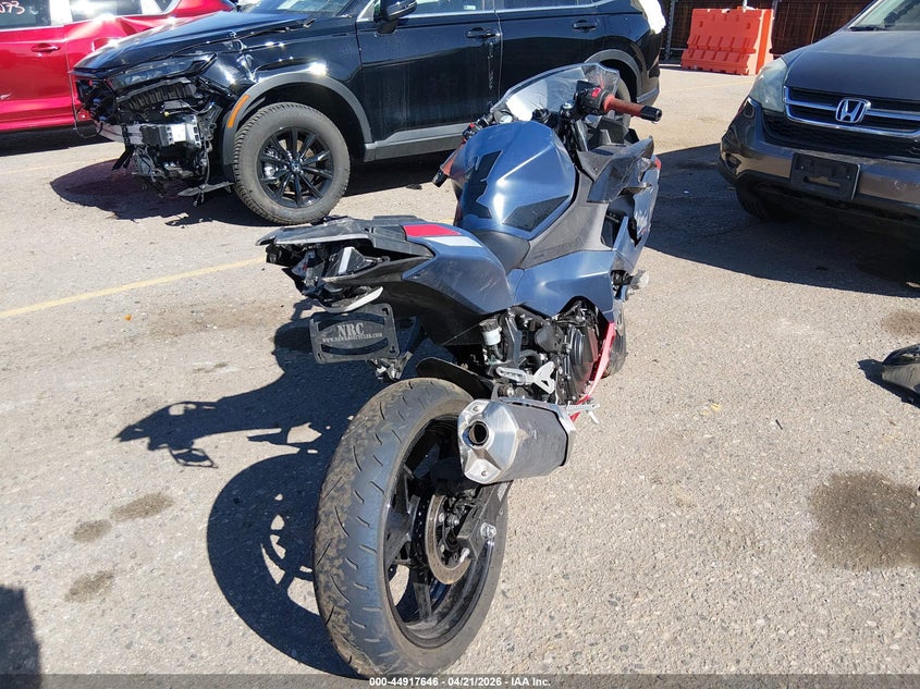 2026 Kawasaki Ninja VIN ML5EXGJ10TDA75826 IAAI salvage auction — FRONT & REAR, Salvage (Colorado), sold $1,100 on 2026-07-08 (photo 4)