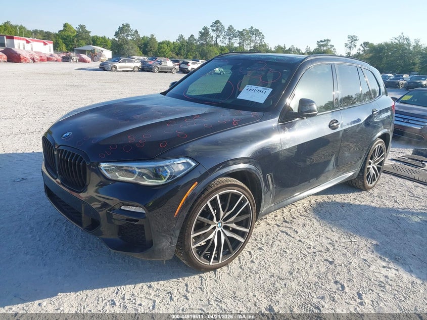 2020 BMW X5 VIN 5UXCR6C09LLL74772 IAAI salvage auction — STORM DAMAGE, Salvage Title, sold $28,550 on 2026-07-16 (photo 2)