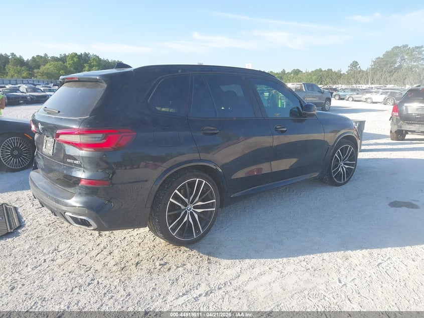 2020 BMW X5 VIN 5UXCR6C09LLL74772 IAAI salvage auction — STORM DAMAGE, Salvage Title, sold $28,550 on 2026-07-16 (photo 4)