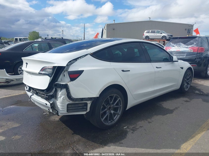 2023 Tesla Model 3 VIN 5YJ3E1EA9PF405937 IAAI salvage auction — REAR END, Salvage (Utah), sold $7,400 on 2026-07-23 (photo 4)