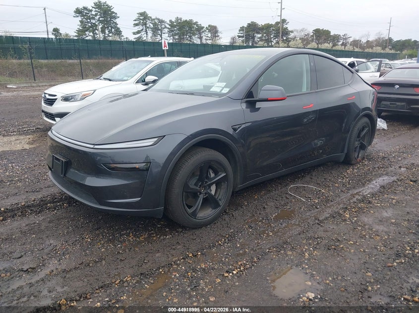 2026 Tesla Model y VIN 7SAYGDEE3TA386686 IAAI salvage auction — RIGHT SIDE, Mv-907A (New York), sold $15,450 on 2026-07-23 (photo 2)