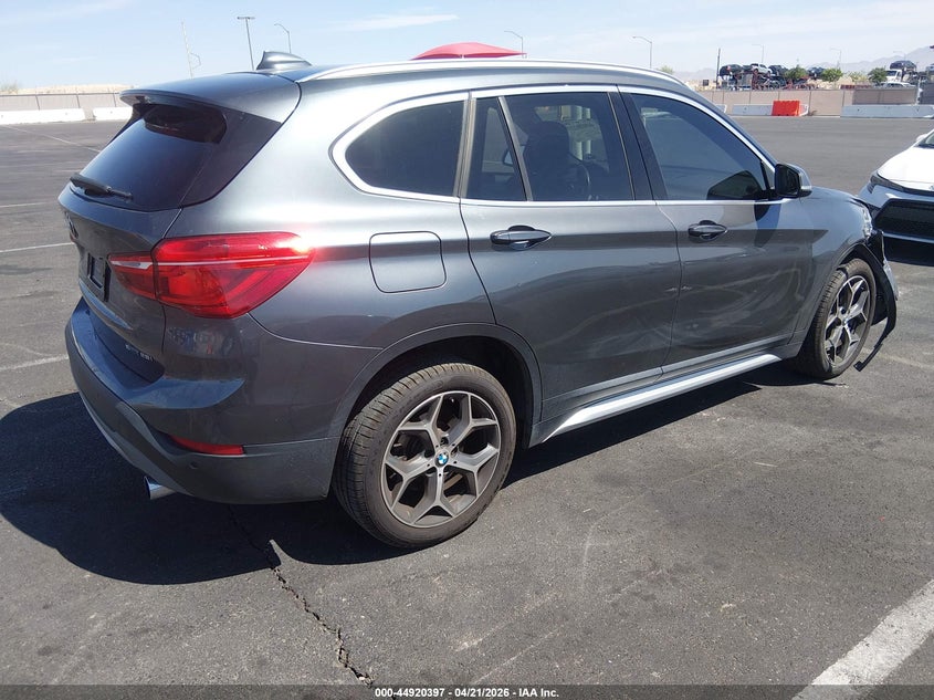 2019 BMW X1 VIN WBXHU7C57K3H46332 IAAI salvage auction — RIGHT FRONT, Salvage Title, sold $2,050 on 2026-07-24 (photo 4)