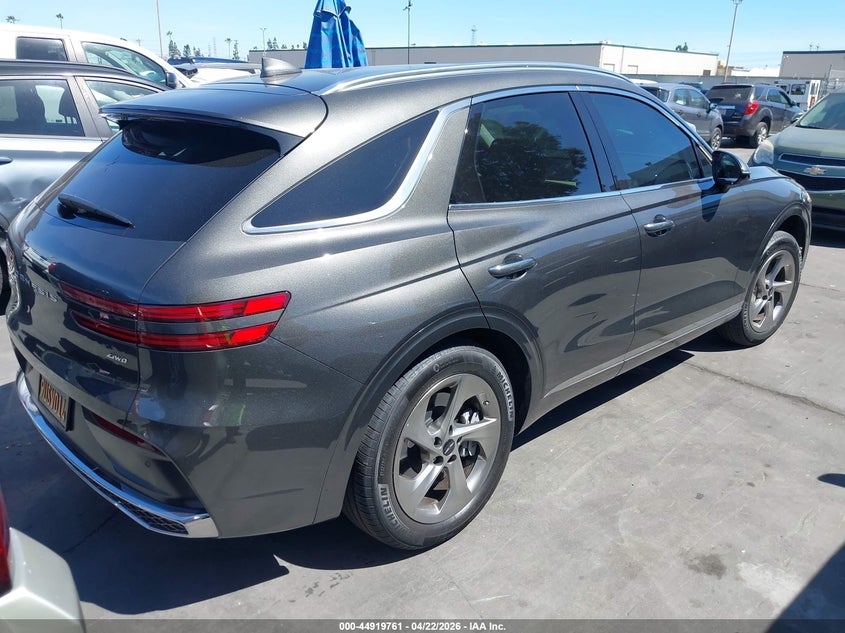 2026 Genesis Gv70 VIN KMUMADTB5TU240352 IAAI salvage auction — SIDE, Salvage Title, sold $15,600 on 2026-09-09 (photo 4)