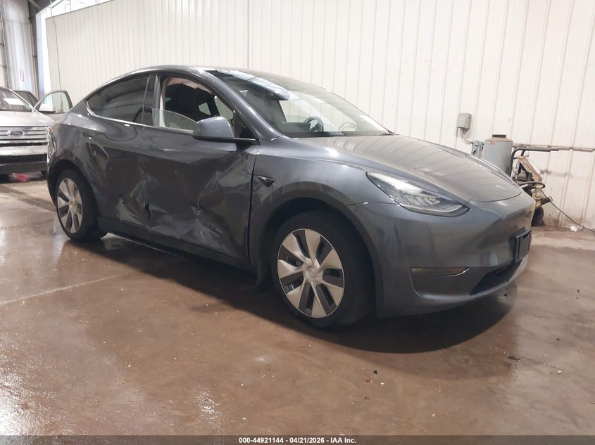 2023 Tesla Model y VIN 7SAYGDEEXPA155869 IAAI salvage auction — RIGHT SIDE, Salvage Title, sold $12,600 on 2026-07-07 (photo 1)