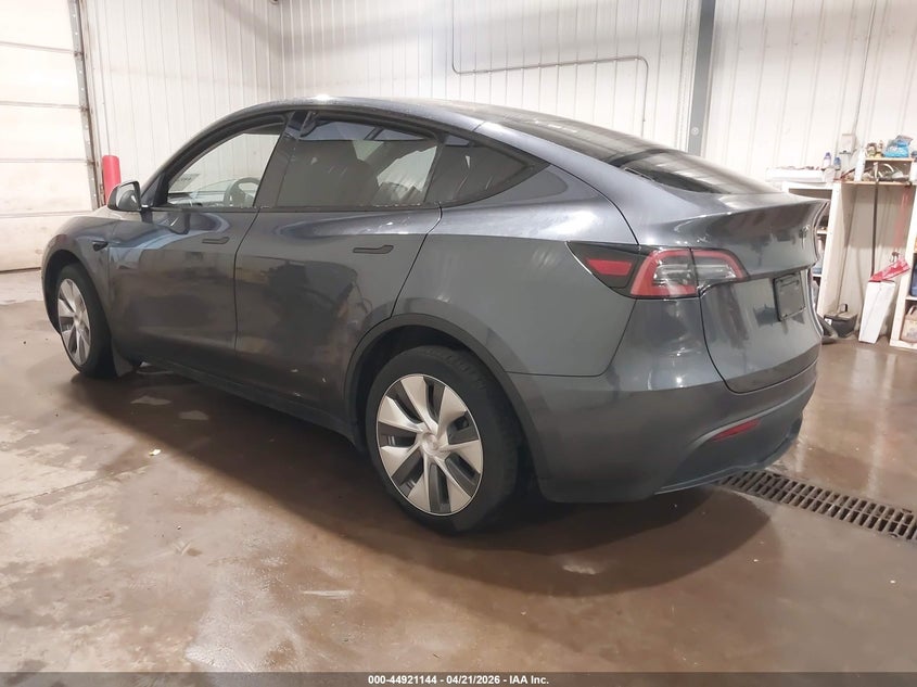 2023 Tesla Model y VIN 7SAYGDEEXPA155869 IAAI salvage auction — RIGHT SIDE, Salvage Title, sold $12,600 on 2026-07-07 (photo 3)