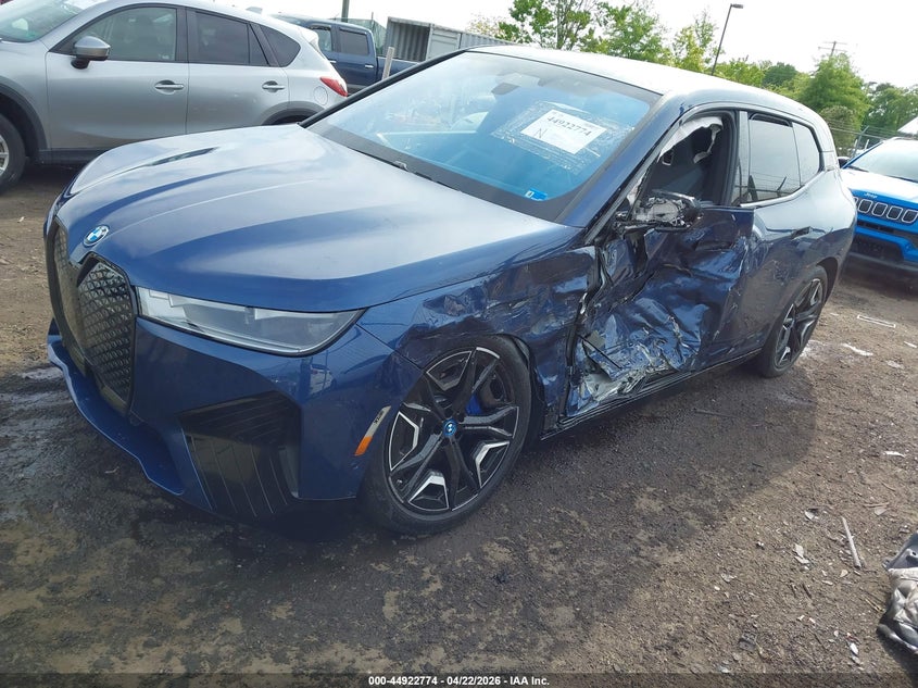 2024 BMW Ix VIN WB523CF02RCS04377 IAAI salvage auction — LEFT SIDE, Wait Title, sold $21,250 on 2026-07-27 (photo 2)