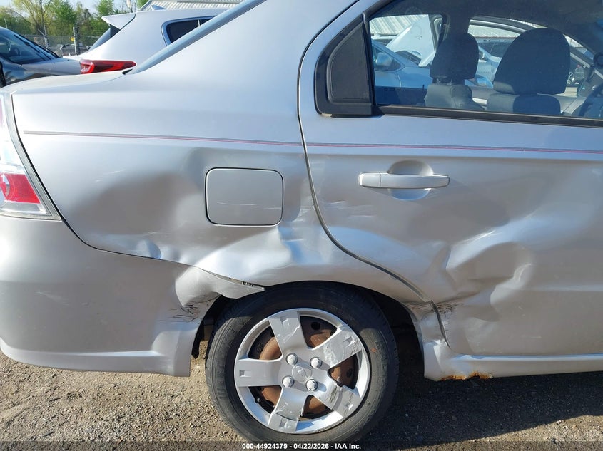 2009 Chevrolet Aveo VIN KL1TD56E89B601988 IAAI salvage auction — LEFT & RIGHT, Salvage (Illinois), sold $425 on 2026-07-13 (photo 6)