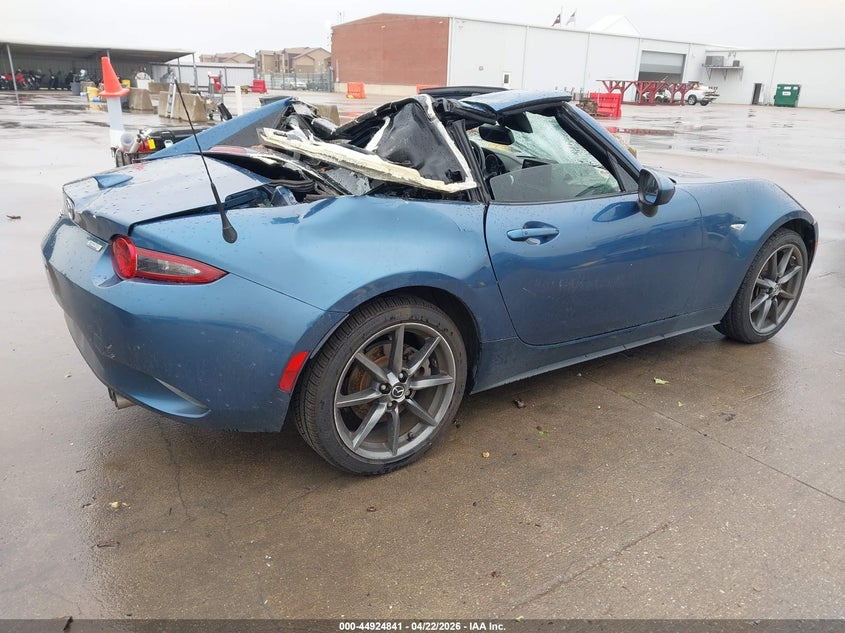 2019 Mazda Mx-5 VIN JM1NDAM77K0300824 IAAI salvage auction — STORM DAMAGE, Salvage Title, sold $2,550 on 2026-07-22 (photo 4)