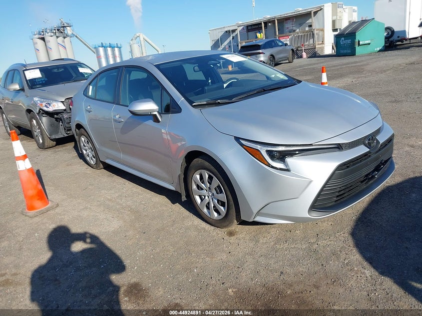 2026 Toyota Corolla VIN JTDBCMFEXT3140392 IAAI salvage auction — LEFT SIDE, Salvage Title, sold $12,975 on 2026-07-14 (photo 1)