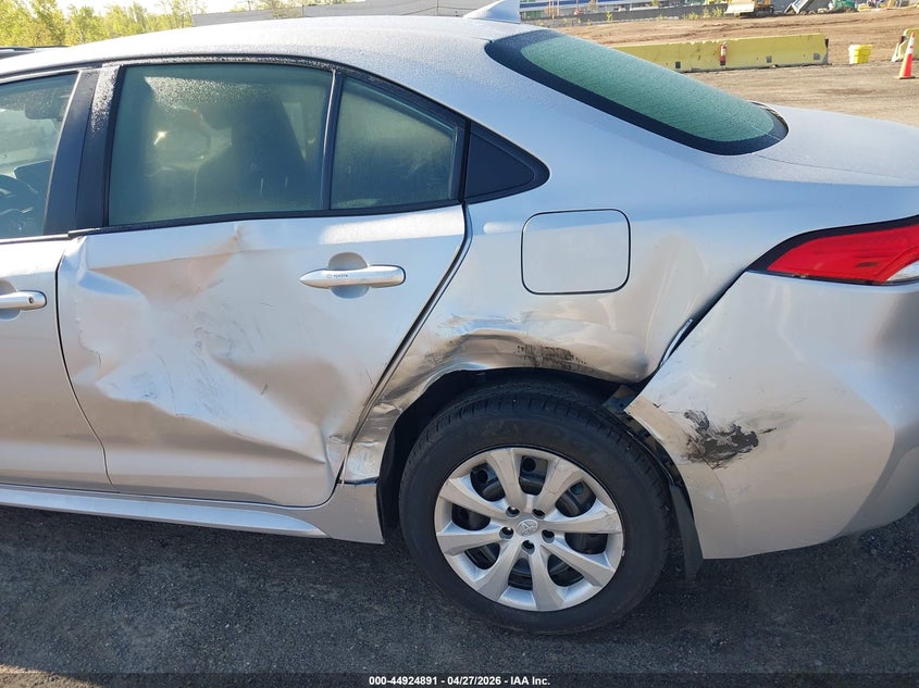 2026 Toyota Corolla VIN JTDBCMFEXT3140392 IAAI salvage auction — LEFT SIDE, Salvage Title, sold $12,975 on 2026-07-14 (photo 6)