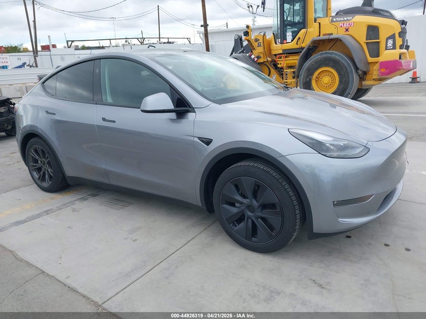 2024 Tesla Model y VIN 7SAYGDEE8RA310793 IAAI salvage auction — LEFT SIDE, Salvage Title, sold $12,300 on 2026-07-08 (photo 1)