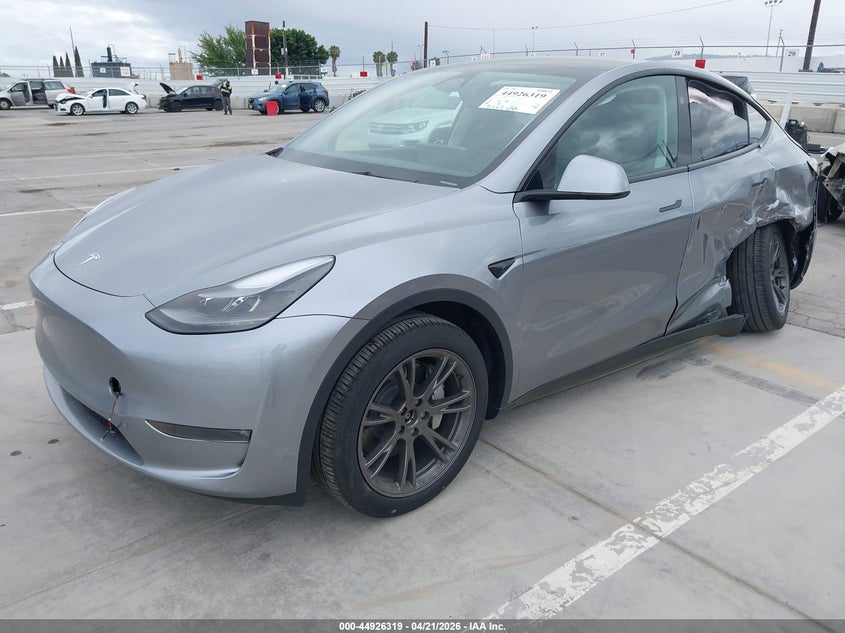 2024 Tesla Model y VIN 7SAYGDEE8RA310793 IAAI salvage auction — LEFT SIDE, Salvage Title, sold $12,300 on 2026-07-08 (photo 2)