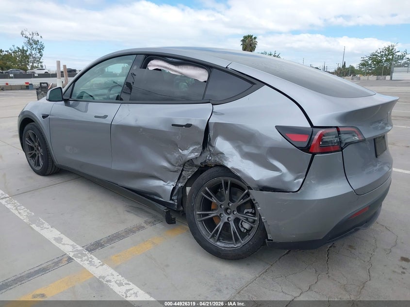 2024 Tesla Model y VIN 7SAYGDEE8RA310793 IAAI salvage auction — LEFT SIDE, Salvage Title, sold $12,300 on 2026-07-08 (photo 3)