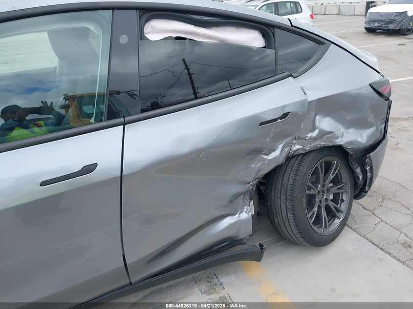 2024 Tesla Model y VIN 7SAYGDEE8RA310793 IAAI salvage auction — LEFT SIDE, Salvage Title, sold $12,300 on 2026-07-08 (photo 6)