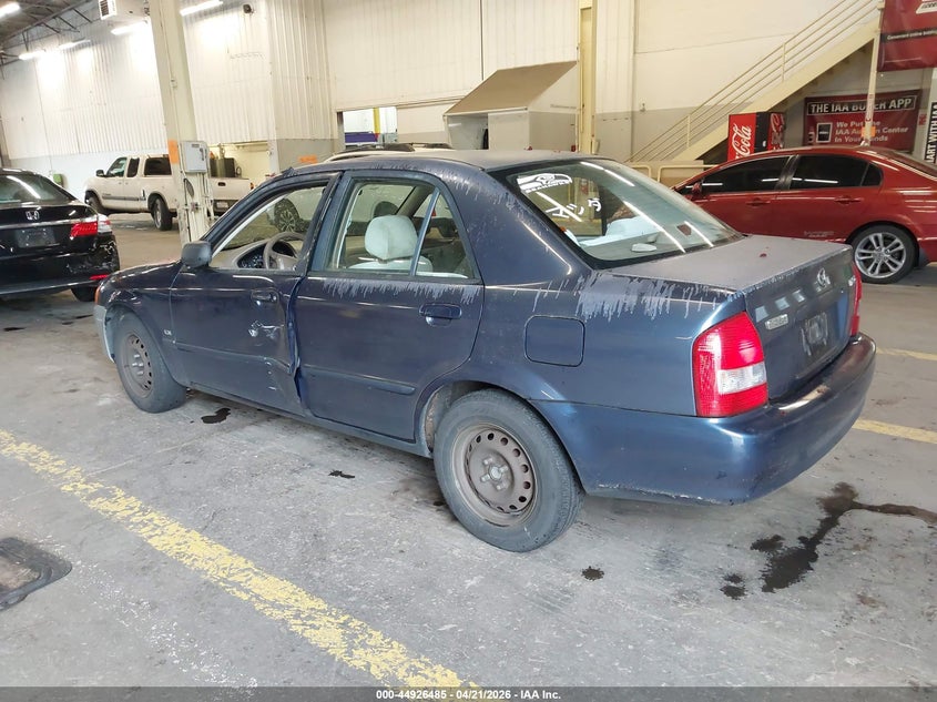 2000 Mazda Protege VIN JM1BJ2223Y0305441 IAAI salvage auction — LEFT SIDE, Salvage (Oregon), sold $100 on 2026-07-09 (photo 3)