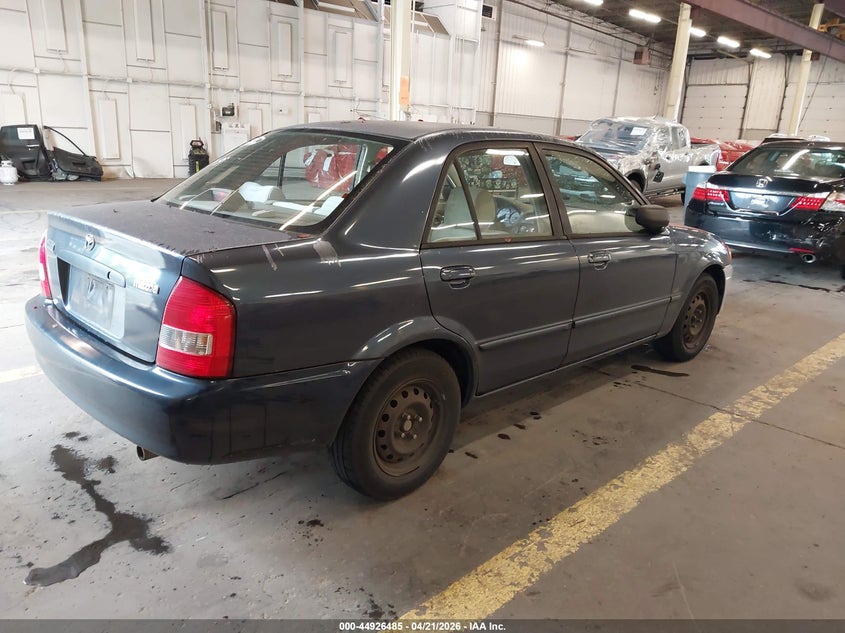 2000 Mazda Protege VIN JM1BJ2223Y0305441 IAAI salvage auction — LEFT SIDE, Salvage (Oregon), sold $100 on 2026-07-09 (photo 4)