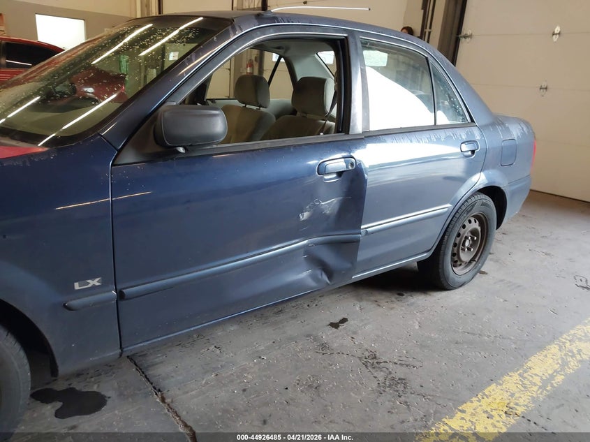 2000 Mazda Protege VIN JM1BJ2223Y0305441 IAAI salvage auction — LEFT SIDE, Salvage (Oregon), sold $100 on 2026-07-09 (photo 6)