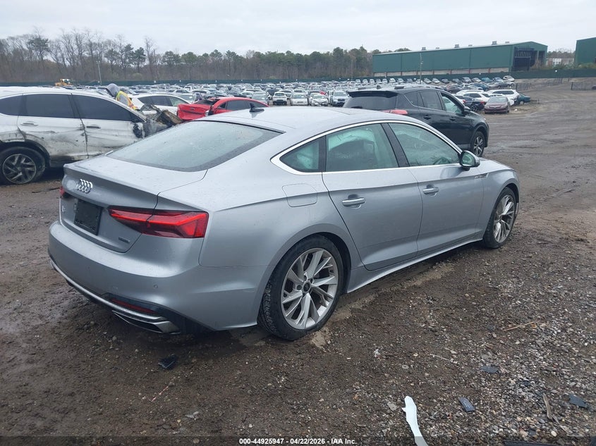 2023 Audi A5 VIN WAUCBCF54PA017980 IAAI salvage auction — LEFT REAR, Salvage (New Jersey), sold $8,400 on 2026-07-28 (photo 4)
