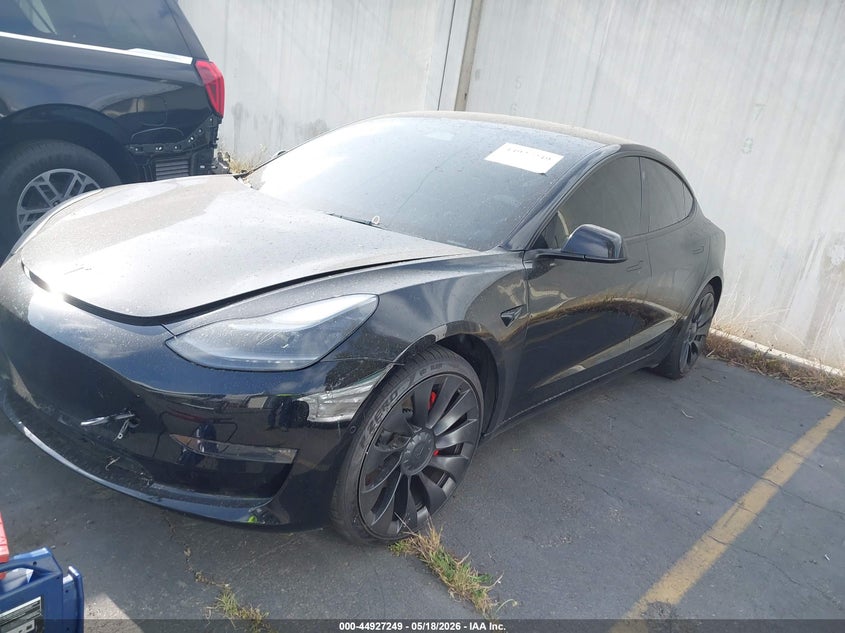 2022 Tesla Model 3 VIN 5YJ3E1EC2NF230400 IAAI salvage auction — REAR END, Salvage Certificate (California), sold $7,400 on 2026-08-21 (photo 2)