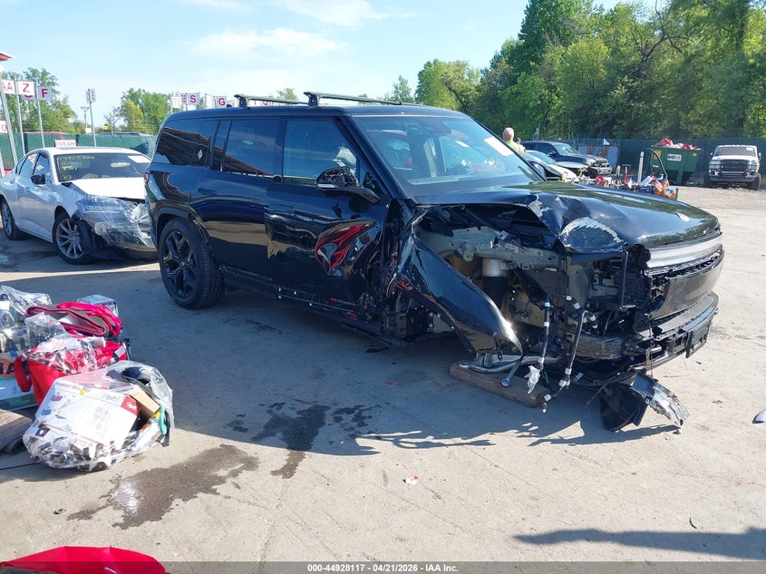 2026 Rivian R1S VIN 7PDSGBBP9TN090825 IAAI salvage auction — LEFT & RIGHT, Salvage Title, sold $9,200 on 2026-09-10 (photo 1)