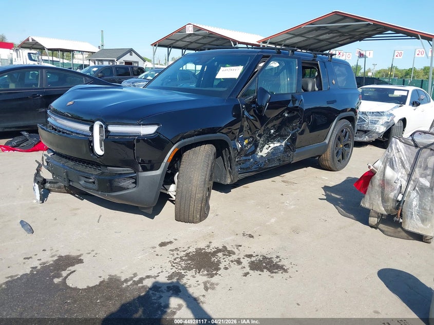 2026 Rivian R1S VIN 7PDSGBBP9TN090825 IAAI salvage auction — LEFT & RIGHT, Salvage Title, sold $9,200 on 2026-09-10 (photo 2)