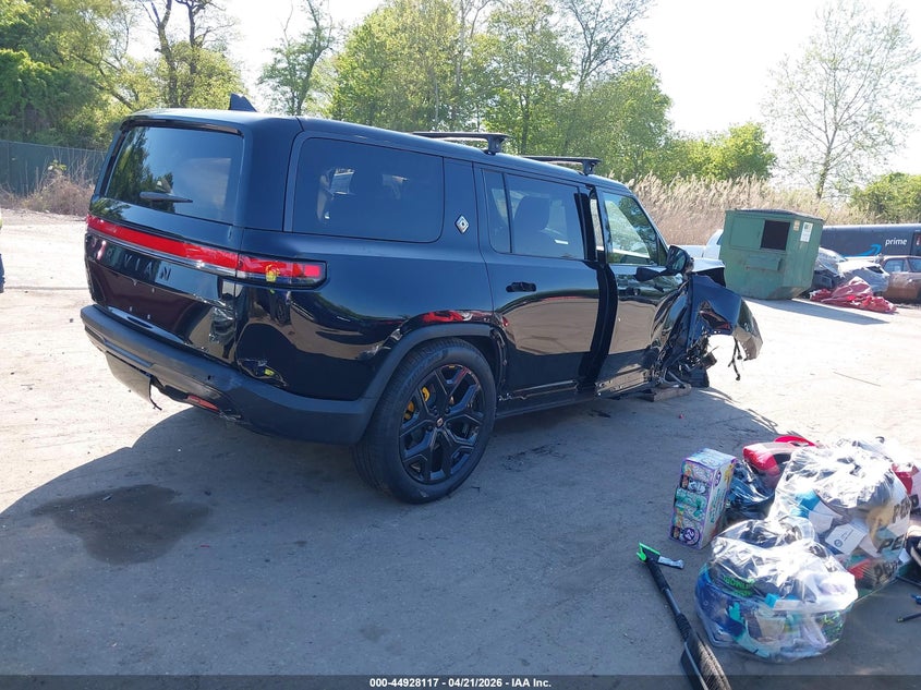 2026 Rivian R1S VIN 7PDSGBBP9TN090825 IAAI salvage auction — LEFT & RIGHT, Salvage Title, sold $9,200 on 2026-09-10 (photo 4)