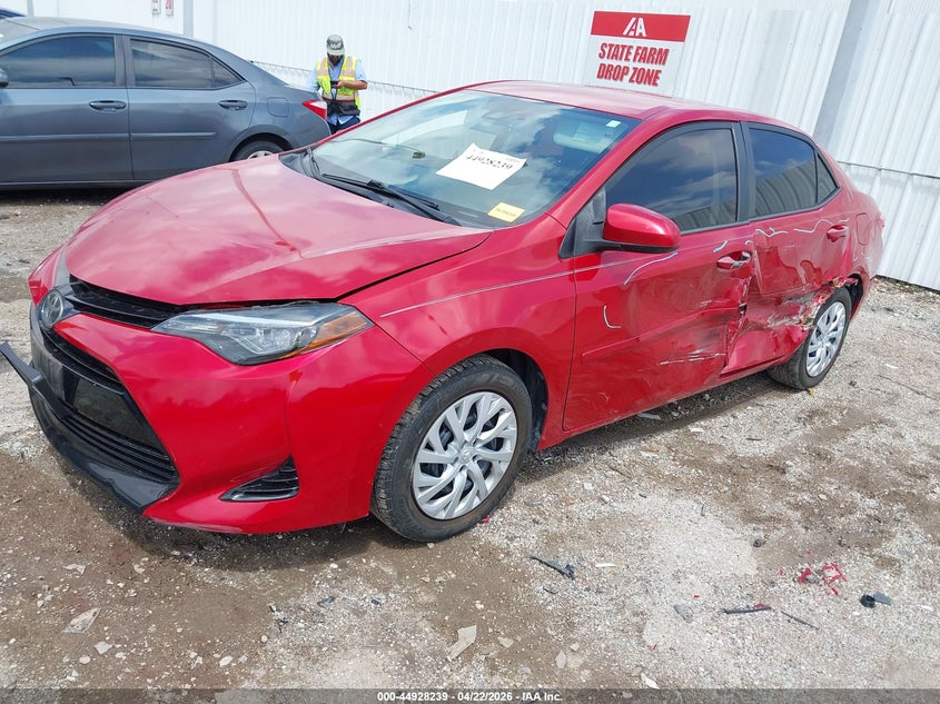2018 Toyota Corolla VIN 5YFBURHEXJP771137 IAAI salvage auction — LEFT SIDE, Original (Texas), sold $4,850 on 2026-07-09 (photo 2)
