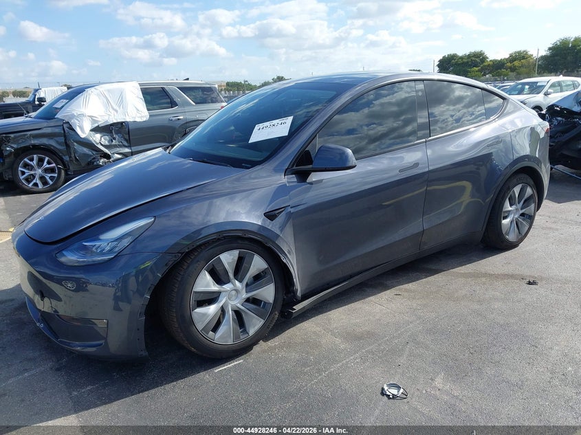 2023 Tesla Model y VIN 7SAYGDEE7PA110646 IAAI salvage auction — UNDERCARRIAGE, Rebuildable (Florida), sold $14,200 on 2026-07-30 (photo 2)