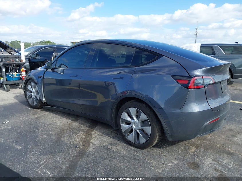 2023 Tesla Model y VIN 7SAYGDEE7PA110646 IAAI salvage auction — UNDERCARRIAGE, Rebuildable (Florida), sold $14,200 on 2026-07-30 (photo 3)