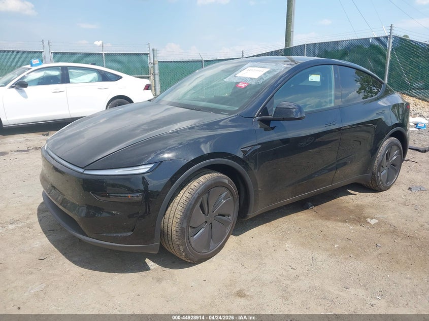 2026 Tesla Model y VIN 7SAYGDED1TA664458 IAAI salvage auction — SIDE, Salvage Title, sold $17,600 on 2026-07-29 (photo 2)