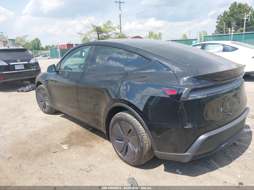 2026 Tesla Model y VIN 7SAYGDED1TA664458 IAAI salvage auction — SIDE, Salvage Title, sold $17,600 on 2026-07-29 (photo 3)