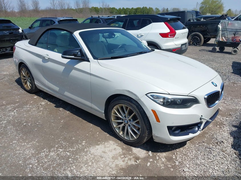 2016 BMW 2er VIN WBA1K9C57GV321974 IAAI salvage auction — REAR END, Salvage Title, sold $2,450 on 2026-07-09 (photo 1)