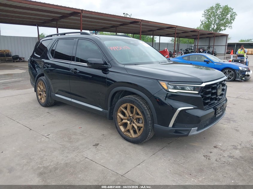 2023 Honda Pilot VIN 5FNYG2H74PB003345 — IAAI salvage auction photo