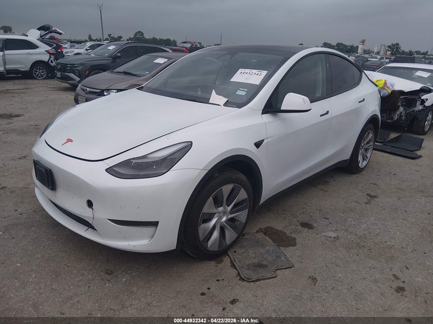 2024 Tesla Model y VIN 7SAYGDEE4RA257896 IAAI salvage auction — REAR END, Original (Texas), sold $13,000 on 2026-07-23 (photo 2)
